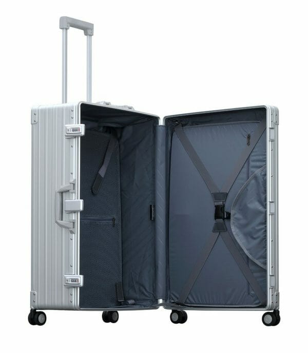 checked luggage for suits|checked luggage for suits|checked luggage for suits opened|30 inch trunk suitcase with wheels and a garment bag for suits and dresses made in aluminum|30 inch video over view|aluminum large trunk case open|aluminum luggage opened