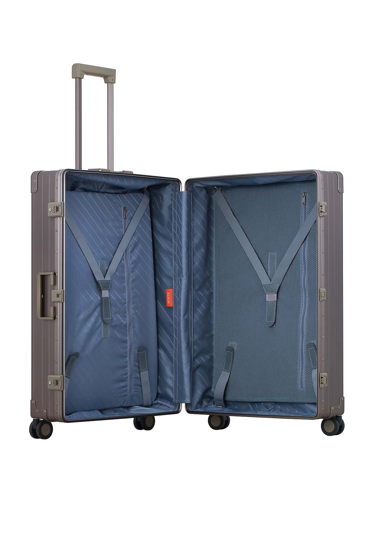 Bronze-32-inch-luggage|The ALEON 32″ bronze Macro Plus glides smoothly through an airport terminal, its high-performance wheels designed for quiet and stable movement. The ergonomic telescoping handle ensures comfortable handling, even in bustling travel environments.|An open ALEON 32″ Macro Plus reveals its meticulously organized interior, featuring compression panels and deep compartments that o