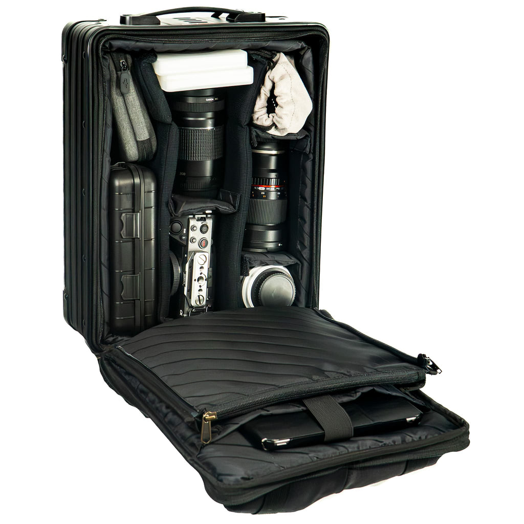 Open camera travel case displays organized photography equipment, including lenses, camera body, and accessories.
