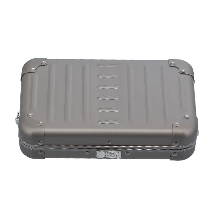 Aluminnum-Hand-Bag-opened-1905-BR|Aleon small bronze crossbody bag featuring interior RFID-blocking pockets for secure storage. The bag is open, showcasing multiple organized compartments designed to protect personal items such as cards and passports. Aleon logo and tagline 'Timeless by design. Built to last.' are displayed in the top right corner.|Aleon bronze crossbody bag designed with aircraft