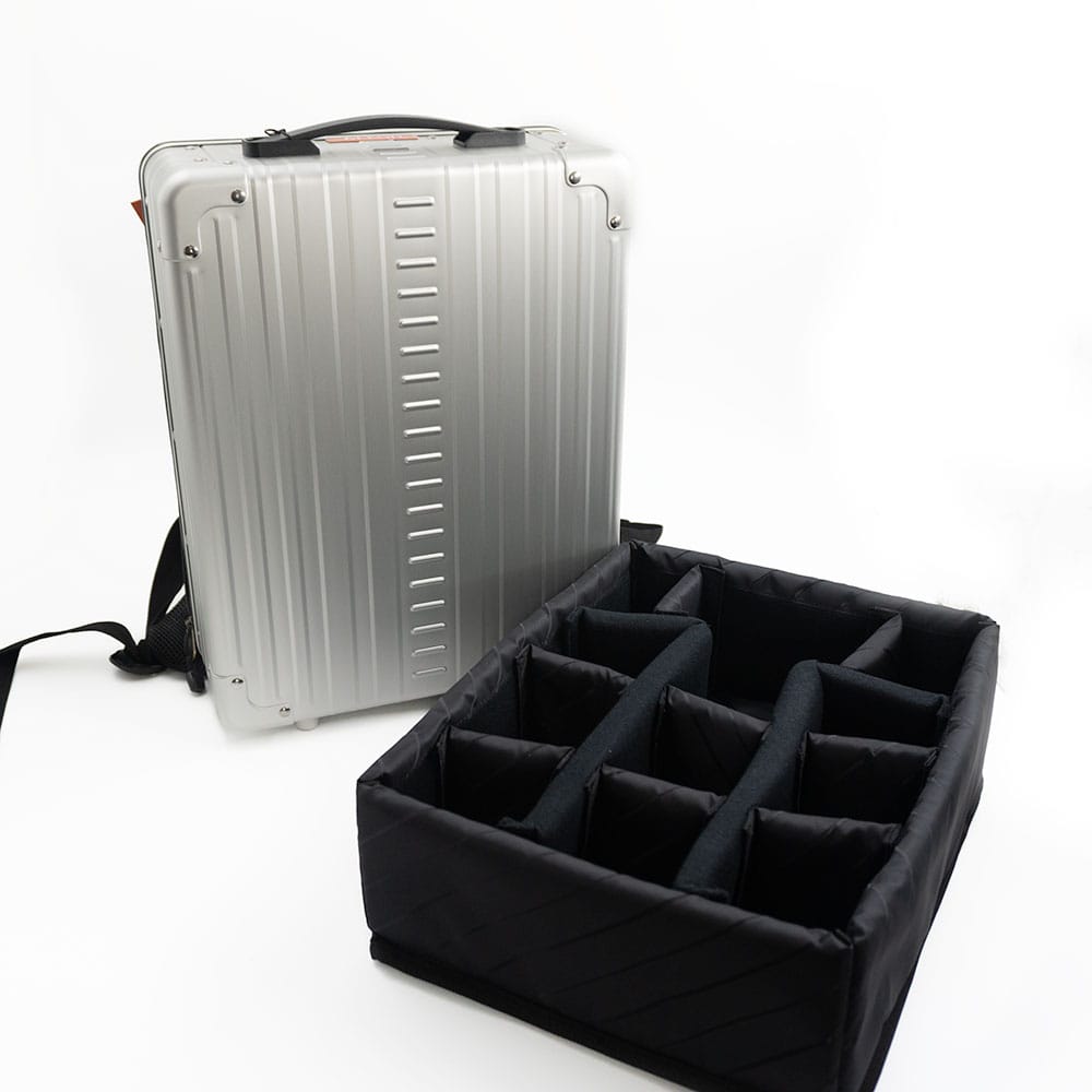 Aluminum Backpack|Aluminum Backpack Silver|16 inch aluminum backpack for busines or a carry on and laptop in bronze|16 inch aluminum backpack for business or a carryon in black|||||||packing cube for photographers|packing cube for photographers|||||16 inch backpack case that holds laptops and photo gear video||||16-inch-bacpack-camera-gear|||Silver Aleon backpack with packing cube|Aleon silver bac