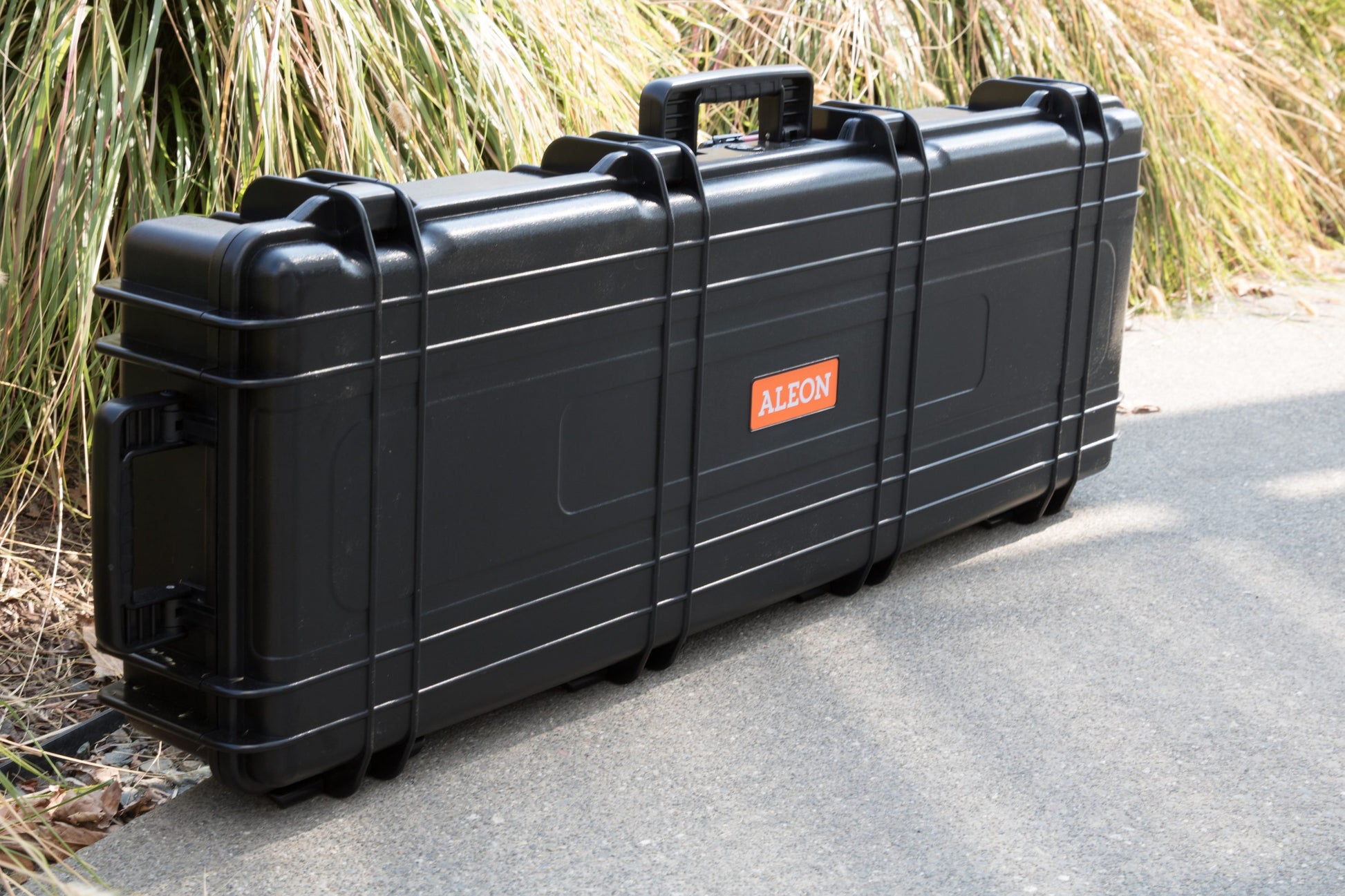 Side view of Aleon 39-inch 2-wheeled long case showing ABS body 