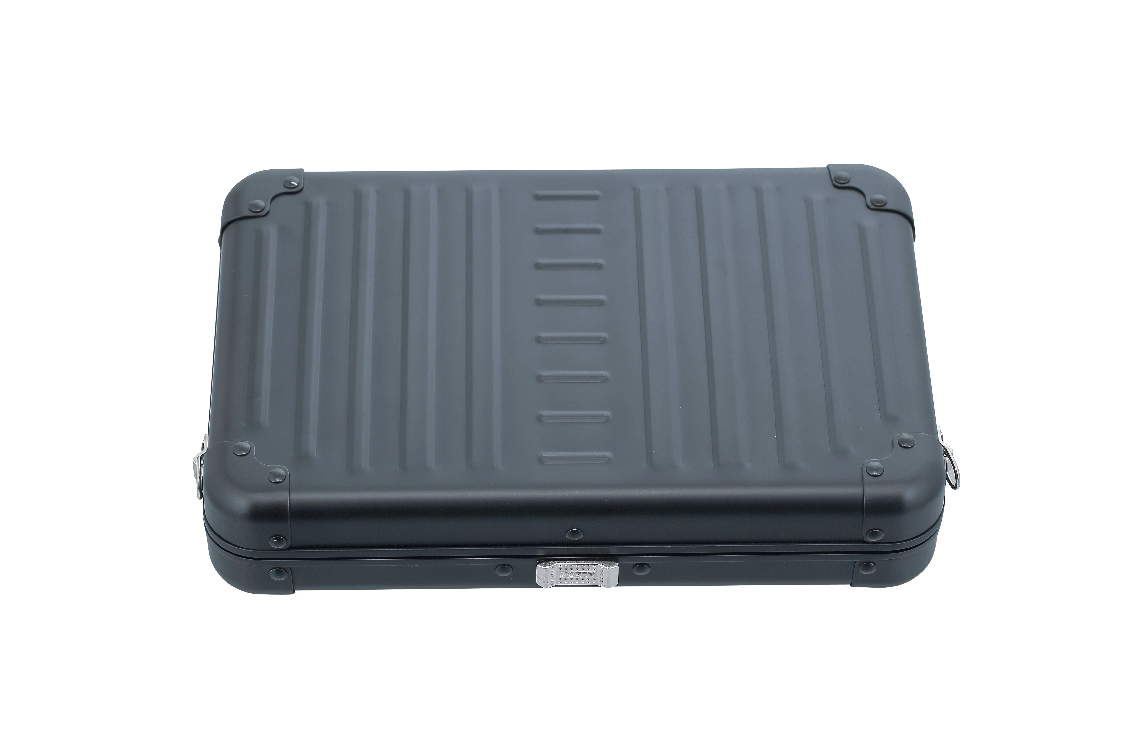 |Aleon onyx black crossbody bag featuring interior RFID-blocking pockets for secure storage. The bag is open, showcasing multiple organized compartments designed to protect personal items such as cards and passports. Aleon logo and tagline 'Timeless by design. Built to last.' are displayed in the top right corner|Aleon large black crossbody bag designed with aircraft-grade aluminum for lasting dur