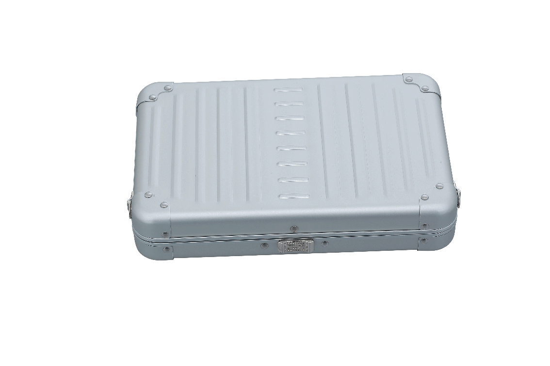 |Aleon large platinum silver crossbody bag featuring interior RFID-blocking pockets for secure storage. The bag is open, showcasing multiple organized compartments designed to protect personal items such as cards and passports. Aleon logo and tagline 'Timeless by design. Built to last.' are displayed in the top right corner.|Aleon large platinum silver crossbody bag designed with aircraft-grade al