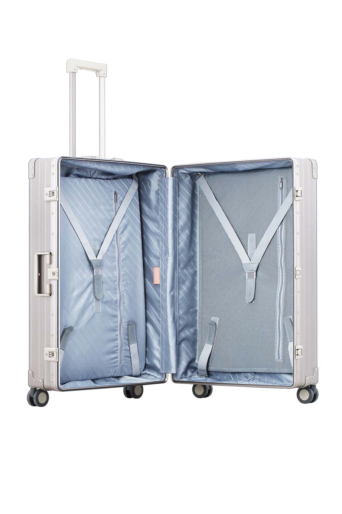 Side front profile of Aleon 32" Checked Luggage made for long trips with durable aluminum exterior||||The ALEON 32″ Macro Plus Traveler, with its brushed aluminum finish, leans against a baggage claim carousel. Its sleek exterior catches ambient lighting, showcasing its premium craftsmanship and refined design built for sophisticated travelers.|Bronze|Onyx Blank Aluminum Luggage Color|Aluminum lug