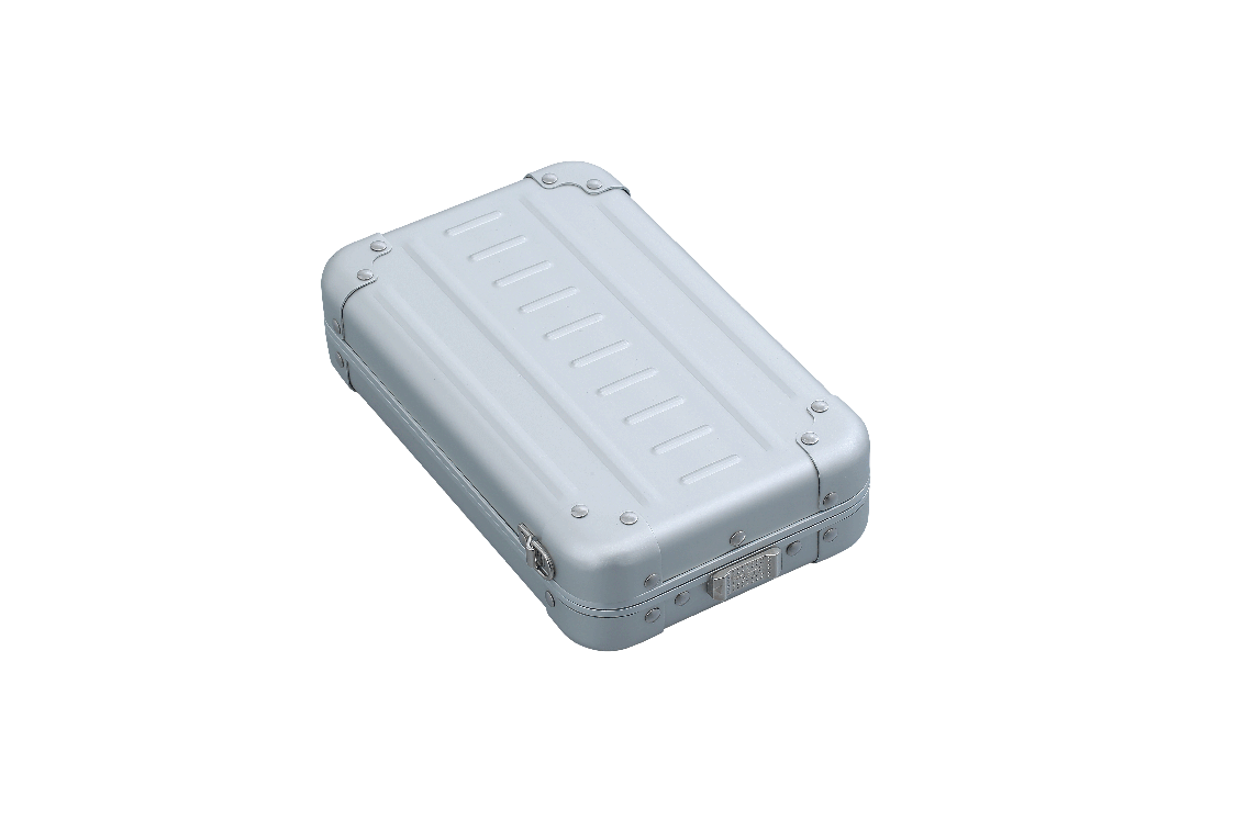 Open cross body case made with aluminum|ALEON vertical crossbody case displayed with highlighted features, including double reinforced aluminum corners for enhanced durability and an aluminum clasp for secure closure. The case is open, revealing organized interior compartments. Brand name 'ALEON' and tagline 'TIMELESS BY DESIGN. BUILT TO LAST.' are shown at the top right.|Aleon vertical crossbody 