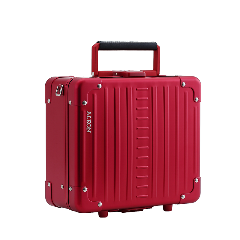 Red Aleon crossbody handbag with aluminum build, Tsa approved key lock and removable shoulder strap