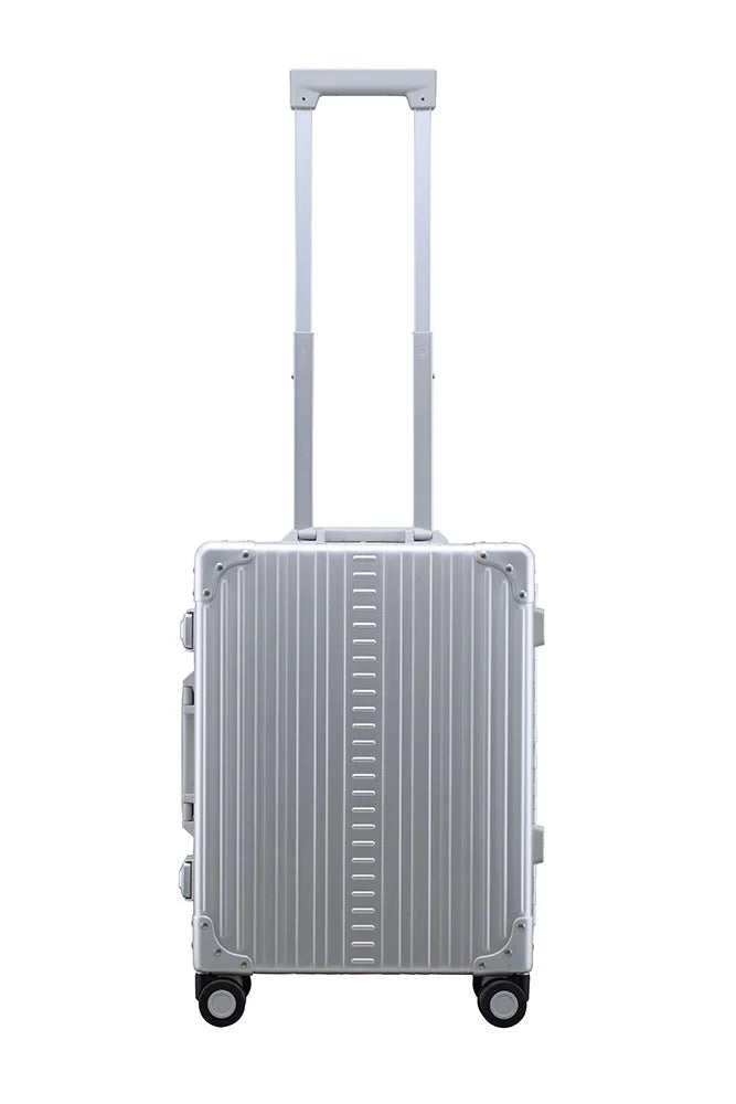 Side profile view of ALEON international carry on in platinum|Front view of ALEON international carry on crafted from aluminum||||International-carry-on-21-inches-in-silver-made-with-aluminum|international-carry-on-luggage made with aluminum overview video|21-Aluminum-International-Carry-On-Silver (1)|21-Aluminum-International-Carry-On--opened-with-2-conpression-boards-silver|21-Aluminum-Internati