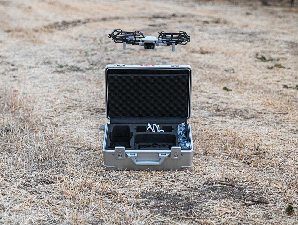 Aleon 15-inch aluminum drone case open with drone fitted inside protective foam compartments