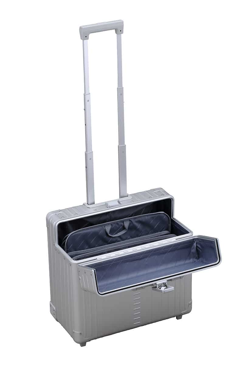 Pilot-case-aluminum-silver|Open platinum silver Aleon pilot case crafted from air craft grade aluminum|Aluminum pilot case with telescoping handle and full length piano hinge or unmatched durability|Silver pilot case with hands free carrying strap|Aluminum Pilots Case open and silver and black|Aluminum Pilots Case handle extended|Aluminum-pilotcase-silver-front-with-piano-hinges video overview|Alu