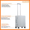 ALEON Carry-On with Suiter standing upright, showcasing its structured aluminum body, reinforced corners, and smooth-rolling wheels for effortless maneuvering
