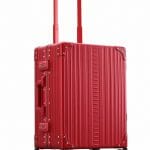 Aluminum red luggage in the style classic carry-on with 4 wheels