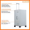 A close-up of the silver suitcase’s high-density double quad wheels, designed for smooth 360-degree rotation. The aluminum side handle is visible, offering an alternative carrying option for convenience.