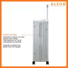 The ALEON 32″ Macro Plus Traveler, with its brushed aluminum finish, leans against a baggage claim carousel. Its sleek exterior catches ambient lighting, showcasing its premium craftsmanship and refined design built for sophisticated travelers.