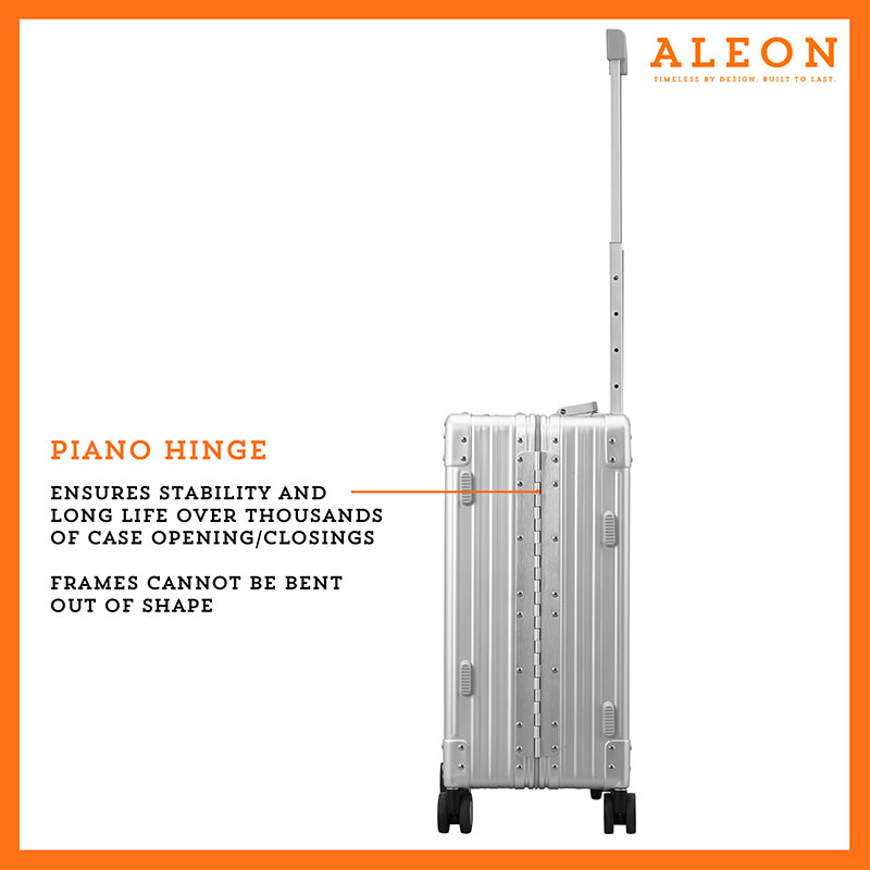 Artboard-4-(2) A polished silver platinum aluminum ALEON 21" Carry-On stands upright on a glossy airport floor, reflecting ambient lighting. Its durable, hard-shell construction and smooth wheels embody modern travel efficiency.