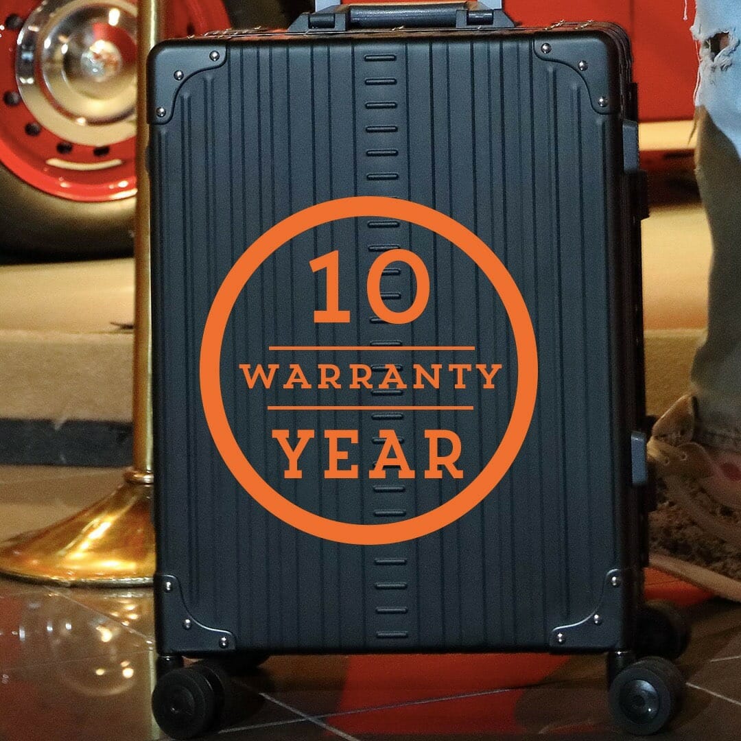 luxury luggage with 10 year warranty