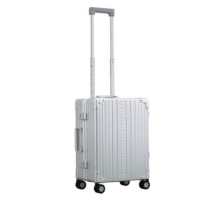 Side profile view of ALEON international carry on in platinum