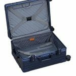 blue-suitcase-on-its-side-to-show-how-trunk-style-luggage-works