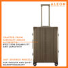 Front view of Aleon checked case with spinner wheels