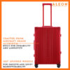 Front view of Aleon red ruby checked case with spinner wheels
