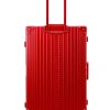 Back view of Ruby Red Aleon checked aluminum luggage highlighting smooth-rolling wheels and sleek design.