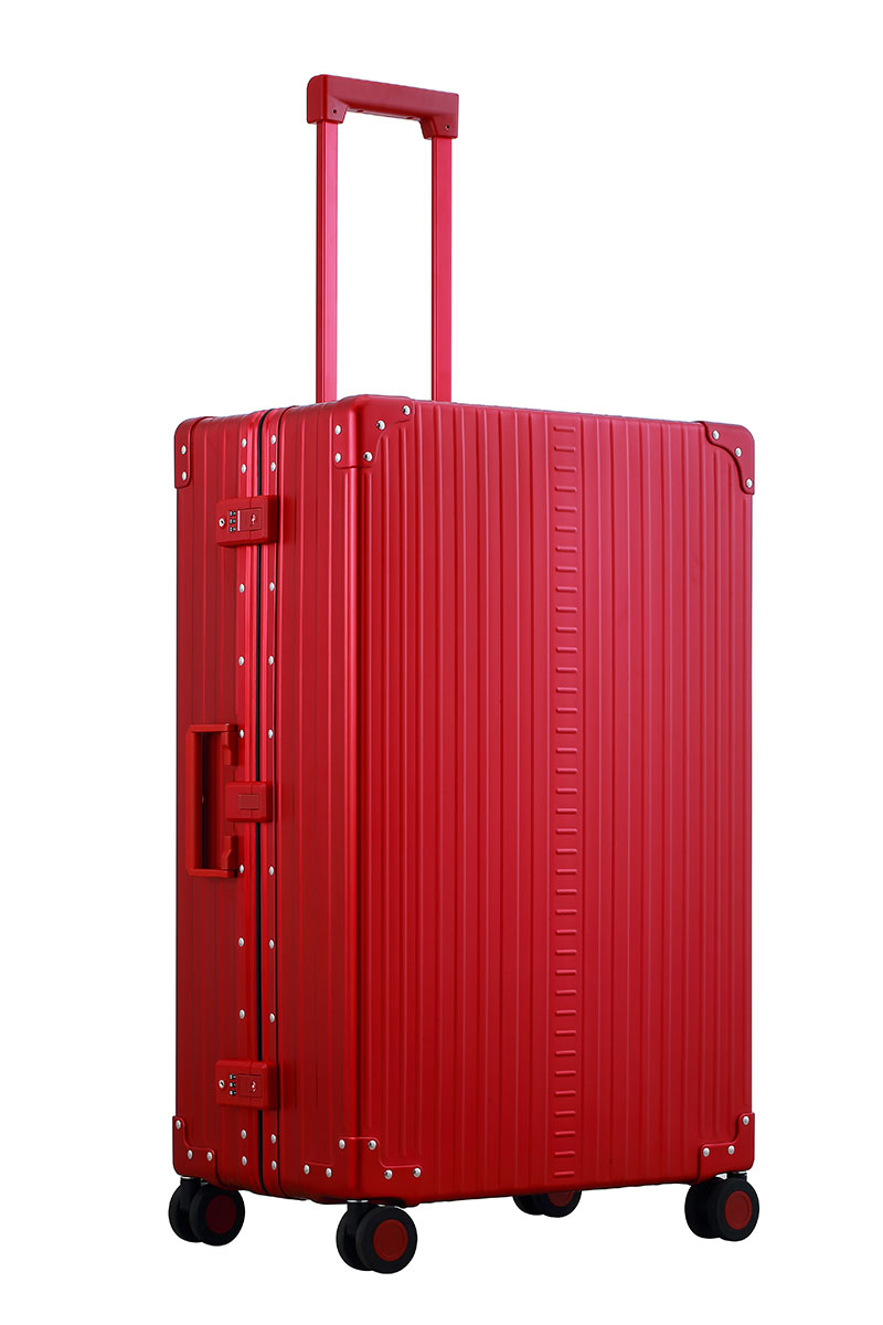 3055-Ru-side Ruby Red Aleon aluminum checked luggage angled side profile showcasing full case design