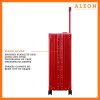 Detailed close-up of the red ruby ALEON Macro Traveler Checked Case’s piano hinges for unbeatable durabiliy