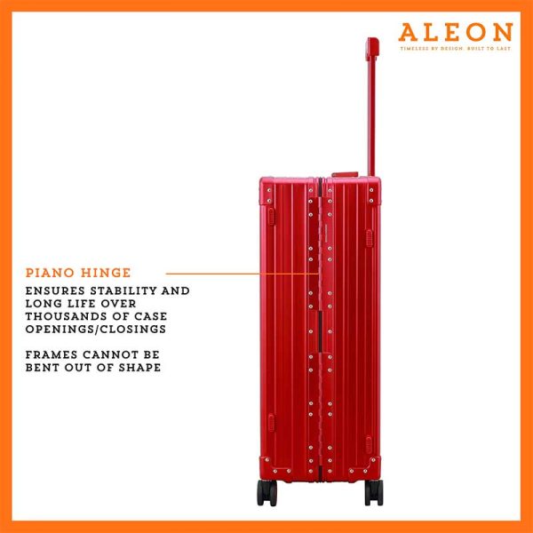 Detailed close-up of the red ruby ALEON Macro Traveler Checked Case’s piano hinges for unbeatable durabiliy