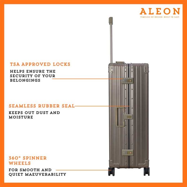 The Bronze ALEON 32″ Macro Plus Traveler Large Check-In, crafted from aircraft-grade aluminum, stands upright on a pristine hotel lobby floor. Its hard-shell design, reinforced corners, and TSA-approved locks emphasize security and durability for long-haul journeys.