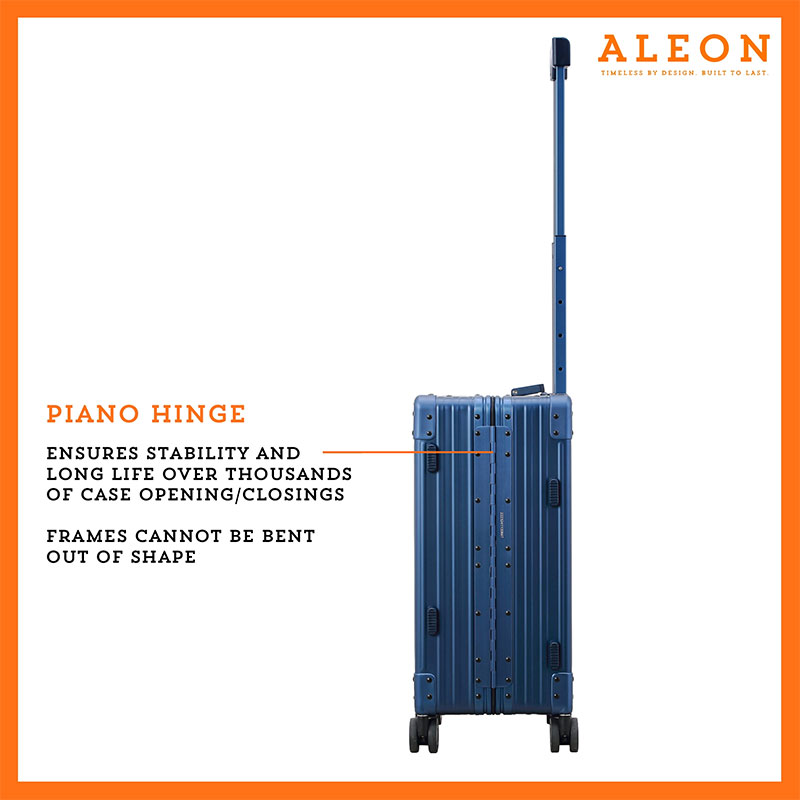 B074B3S7K8-SA-Hinge-(2) The ALEON 21" blue sapphire Carry-On rests beside a plush airport lounge chair, its refined metallic finish complementing the sophisticated travel setting. Designed for durability and elegance, it exudes premium craftsmanship and functionality.