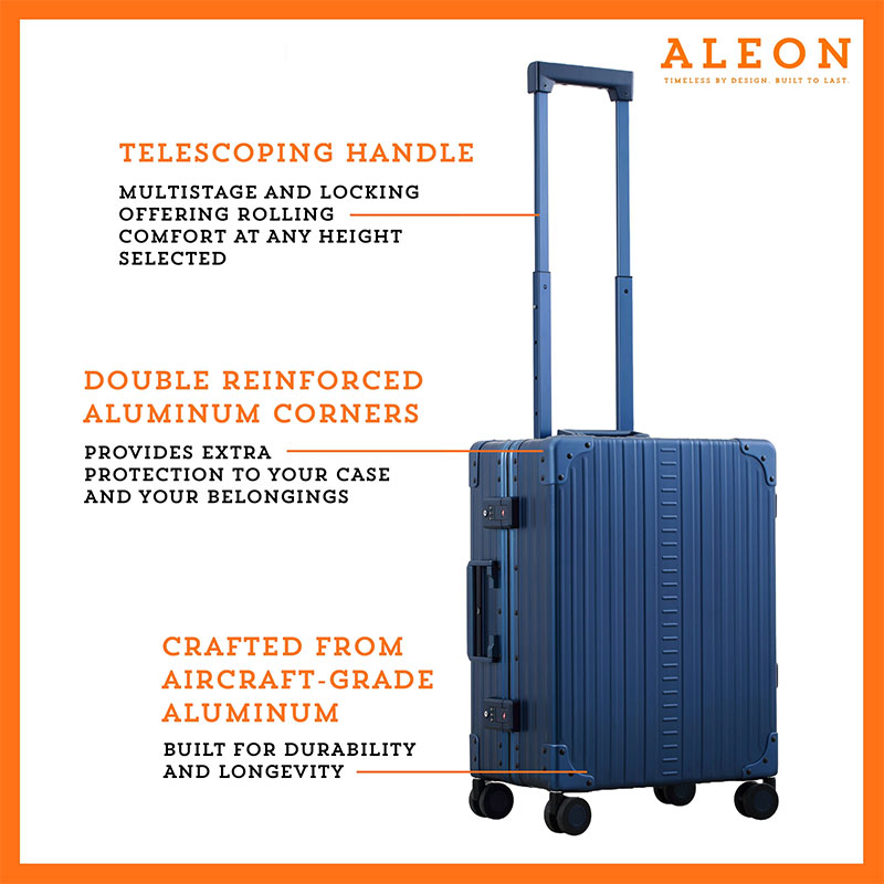 B074B3S7K8-SA-side-(2) A polished aluminum ALEON 21" Carry-On stands upright on a glossy airport floor, reflecting ambient lighting. Its durable, hard-shell construction and smooth wheels embody modern travel efficiency.