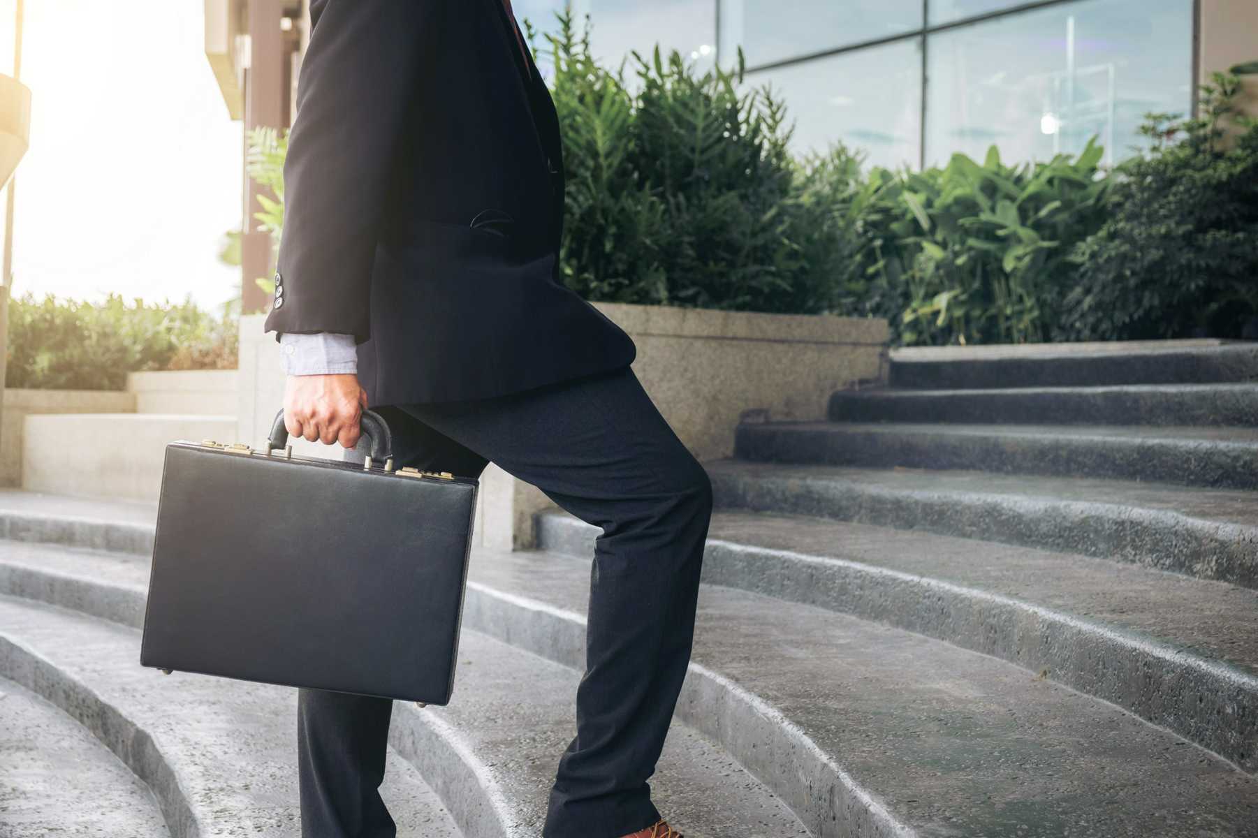 man holding briefcase