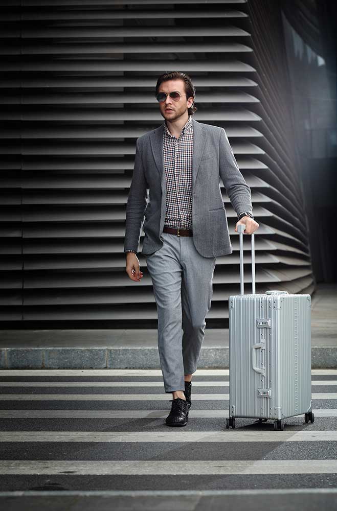 Man-walking-with-luggage