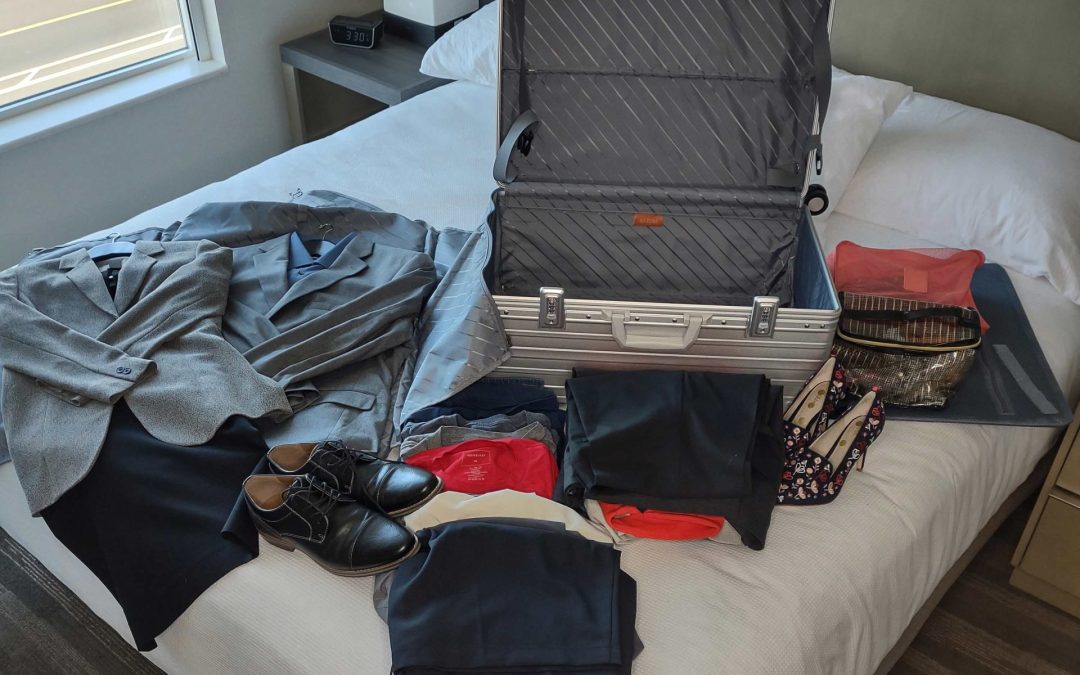 A suitcase that can hold 2 suits in the garment bag