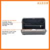 Aleon bronze crossbody bag designed with aircraft-grade aluminum for lasting durability. The bag features an adjustable and removable strap for personalized styling. Aleon logo and tagline 'Timeless by design. Built to last.' are prominently displayed against a clean white background accented with orange borders.