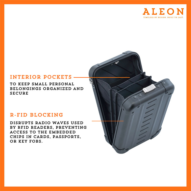 1905-V-ON-open-(2) Aleon vertical onyx black crossbody bag featuring interior RFID-blocking pockets for secure storage. The bag is open, showcasing multiple organized compartments designed to protect personal items such as cards and passports. Aleon logo and tagline 'Timeless by design. Built to last.' are displayed in the top right corner.