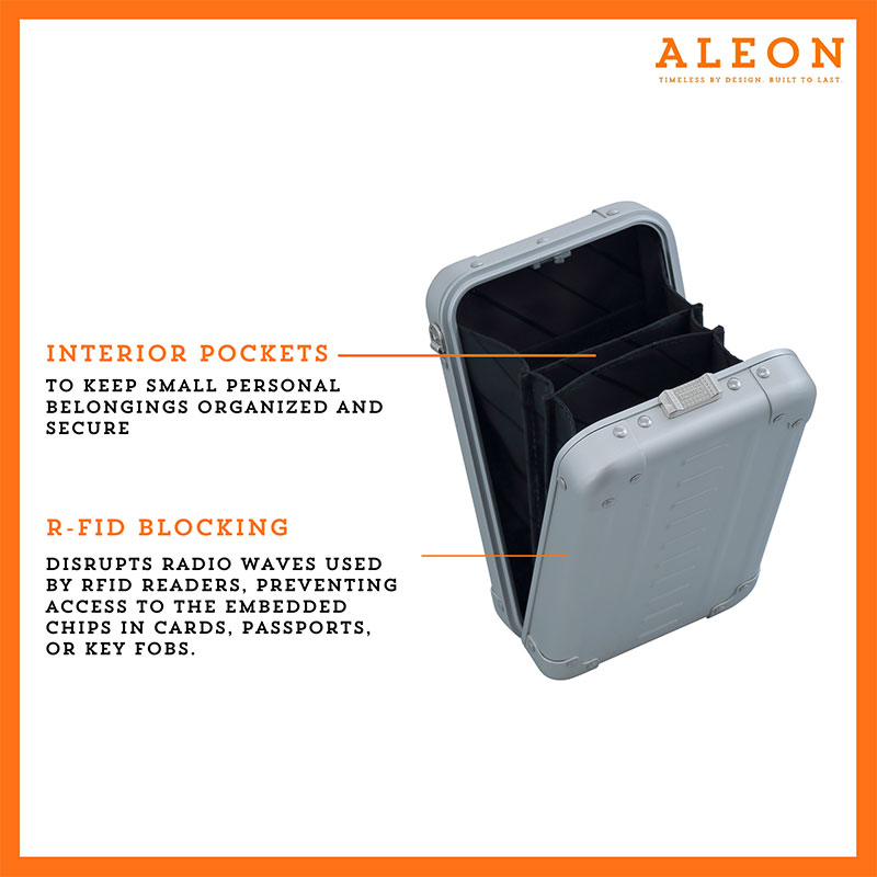1905-V-PL-open-(2) Aleon vertical platinum silver crossbody bag featuring interior RFID-blocking pockets for secure storage. The bag is open, showcasing multiple organized compartments designed to protect personal items such as cards and passports. Aleon logo and tagline 'Timeless by design. Built to last.' are displayed in the top right corner.
