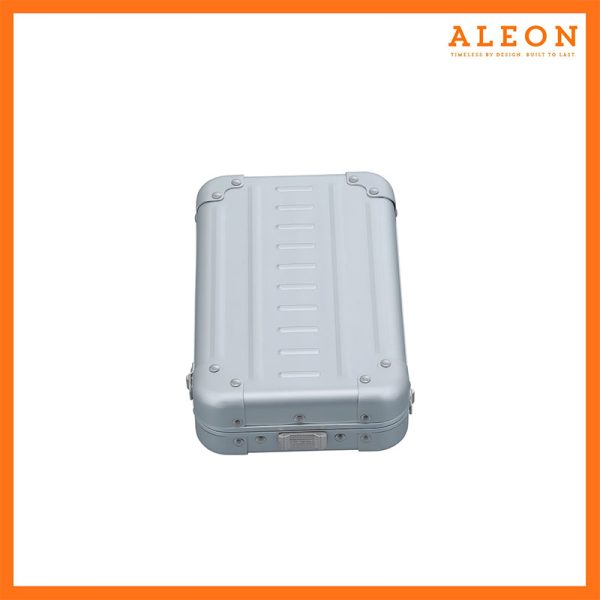 Platinum silver Aleon Vertical opening crossbody case lying flat with opening facing forward